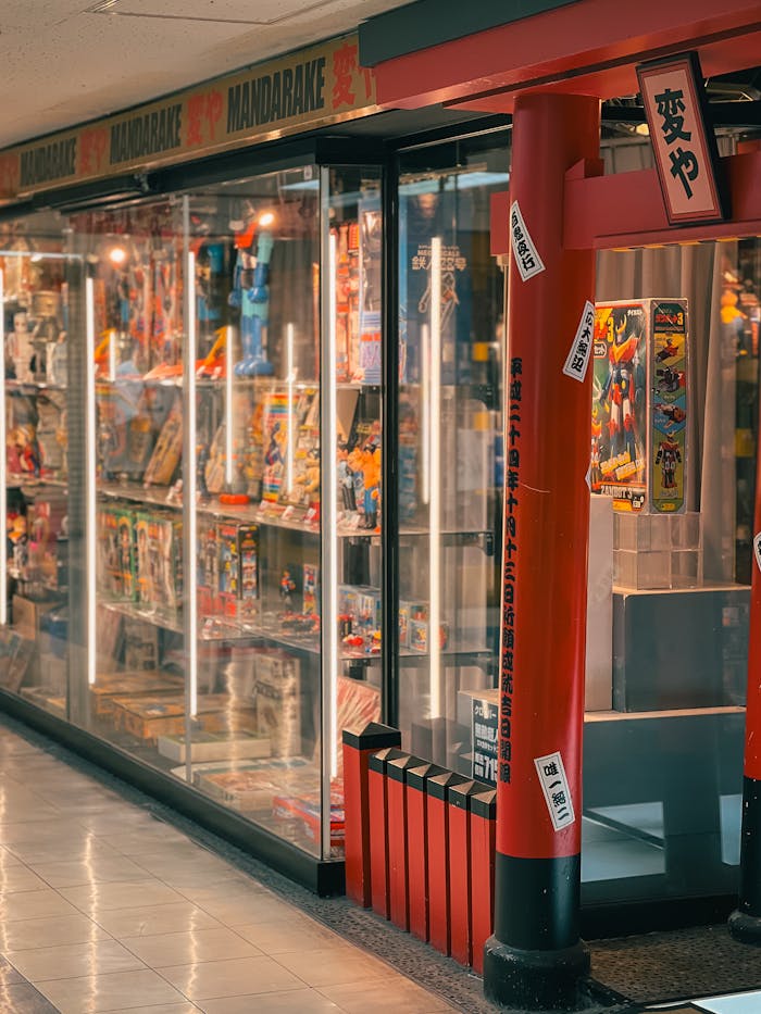 Explore a vibrant Tokyo manga store with colorful displays at night.